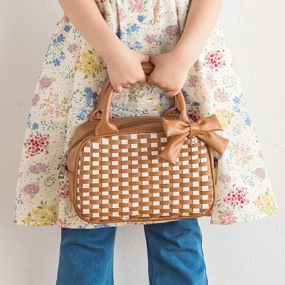 レザー調編み込みリボンチャーム付きミニボストン