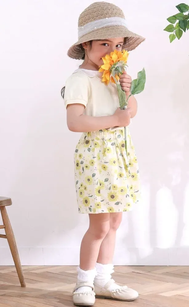 最高気温25℃向け：フリル袖Tシャツとタックショートパンツの女の子コーデ