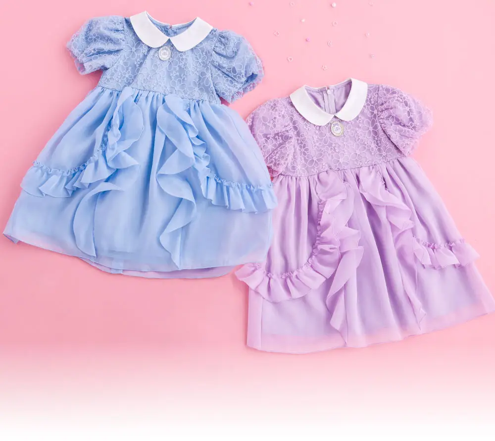 上品な印象を与えるふんわり袖と丸襟のディテールカット