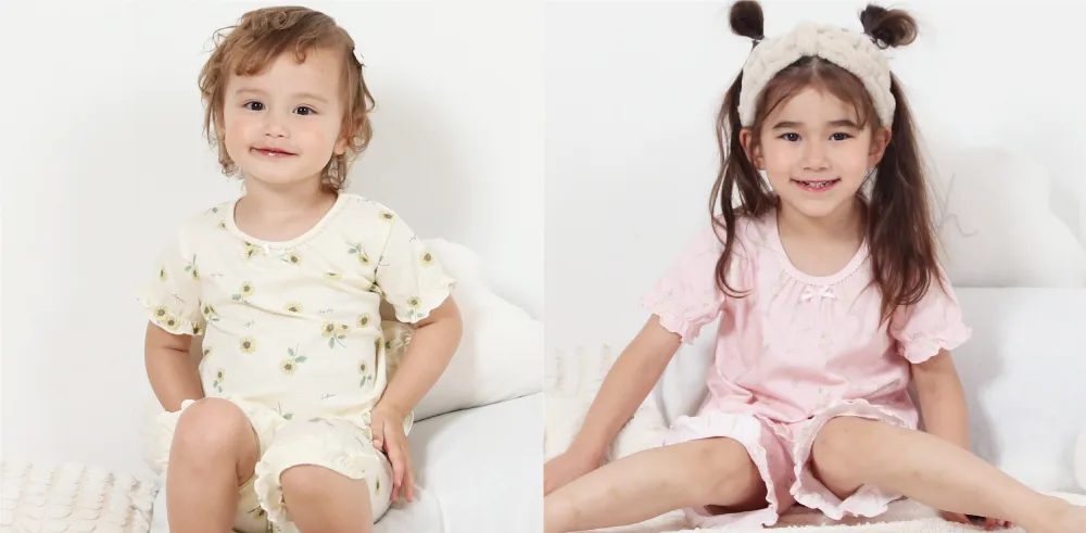 女の子モデルが着用した長袖みんみんパジャマの総柄デザイン